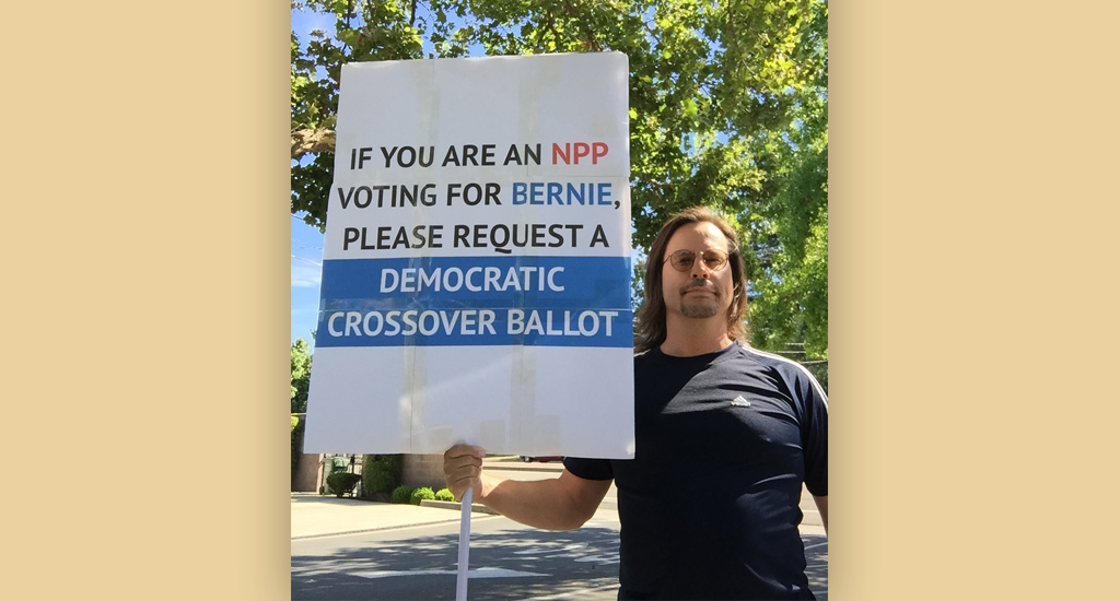 Eric Reynolds, a pledged delegate for Sanders, stood outside a polling place in Walnut Creek in Contra Costa County.