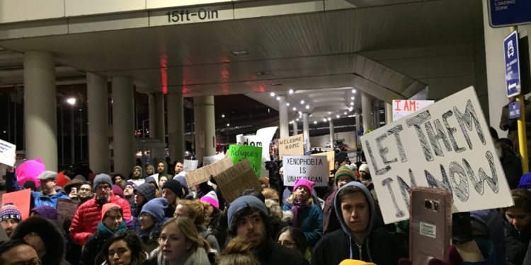 Protesters speak out against Trump's Muslim ban at O'Hare International Airport in Chicago, IL. Photo by Kevin Gosztola.