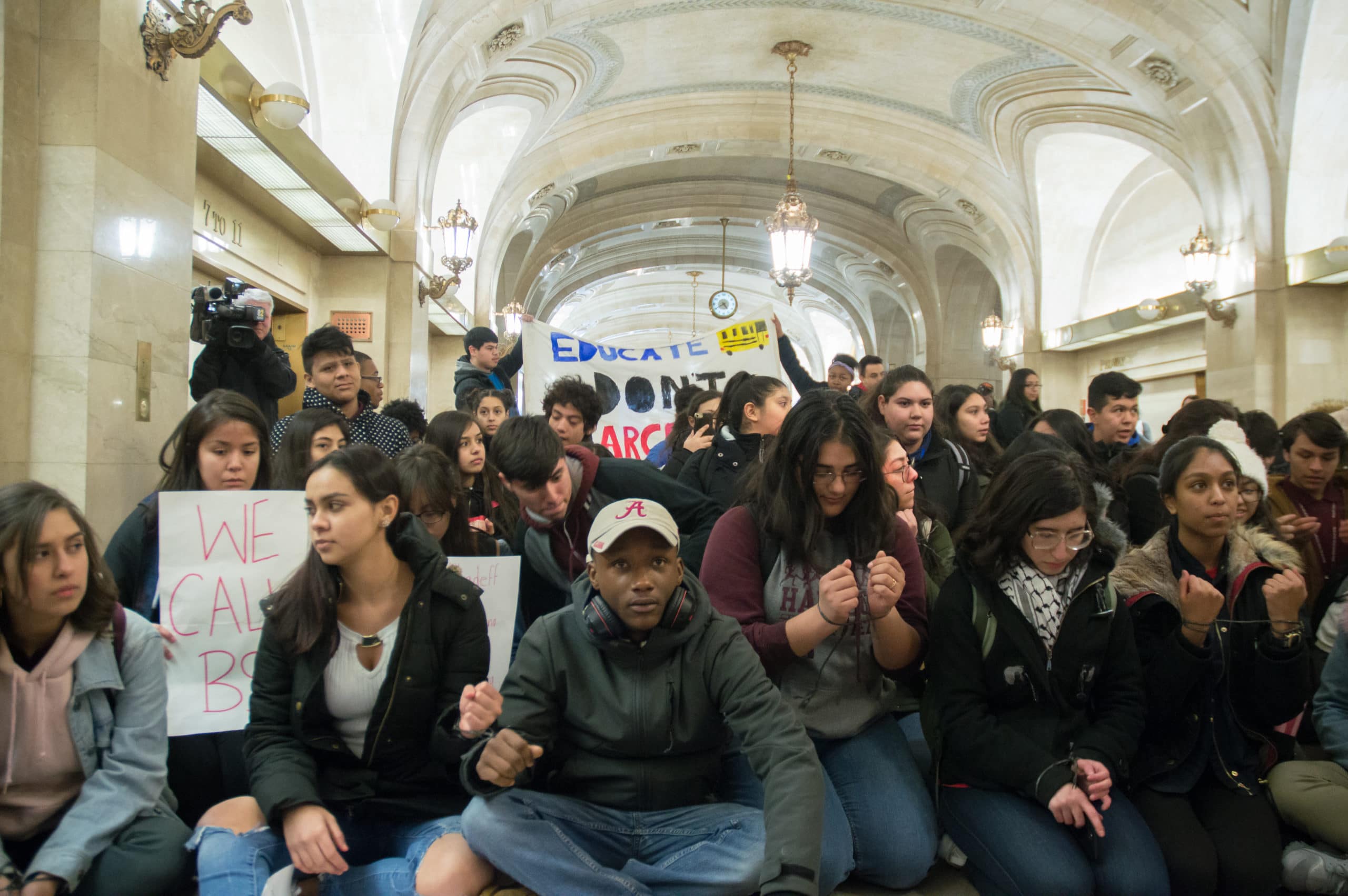 Activists with Good Kids, Mad City lead the front of the 'March for Our Lives' demonstration in Chicago on March 24. Activists with No Cop Academy set up a makeshift graveyard in Chicago's City Hall with tombstones to represent people killed by the police, and programs shut by the city. Chicago youth who took part in the national school walkout over gun violence on March 14th briefly occupied City Hall in the late afternoon to demand the city rethink its plan to open a new $95 million police academy. Photo by Aaron Cynic.