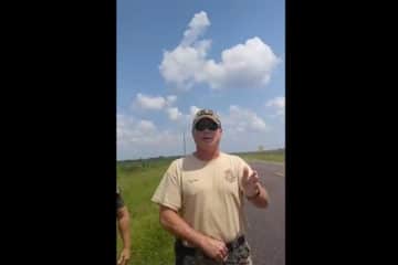 Officers disrupt family outreach outside Holman prison in Alabama. Source: https://www.facebook.com/mona.song.505/videos/154318249087673/